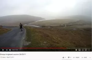 Longboarder at the top of a hill with full visibility