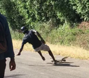 Longboarder falling