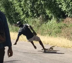 Longboarder in full protective gear