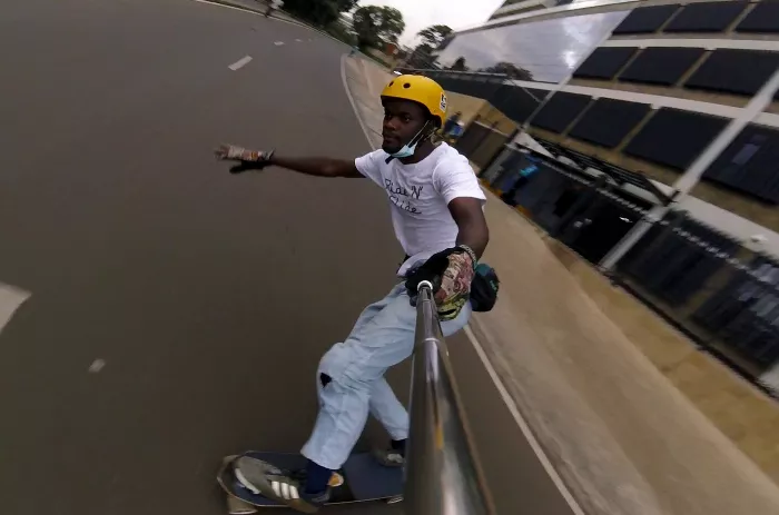 Longboarder performing a toeside stand-up slide on the Slide Perfect Pro-Fluxx