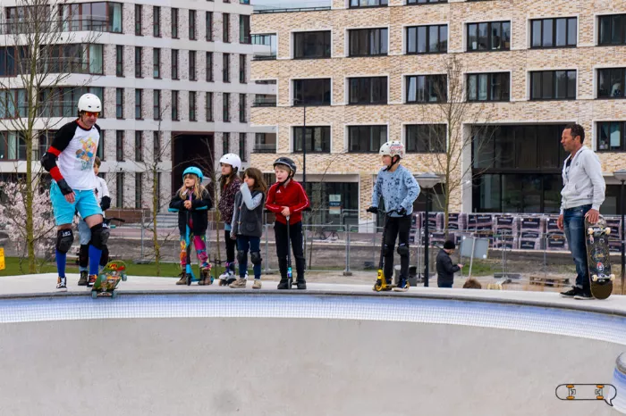 Older skateboarder in a skatepark, showcasing the return to the sport.