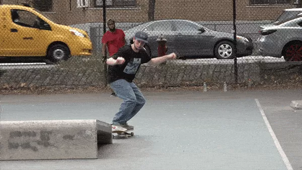 Person pretending to do a nollie heelflip