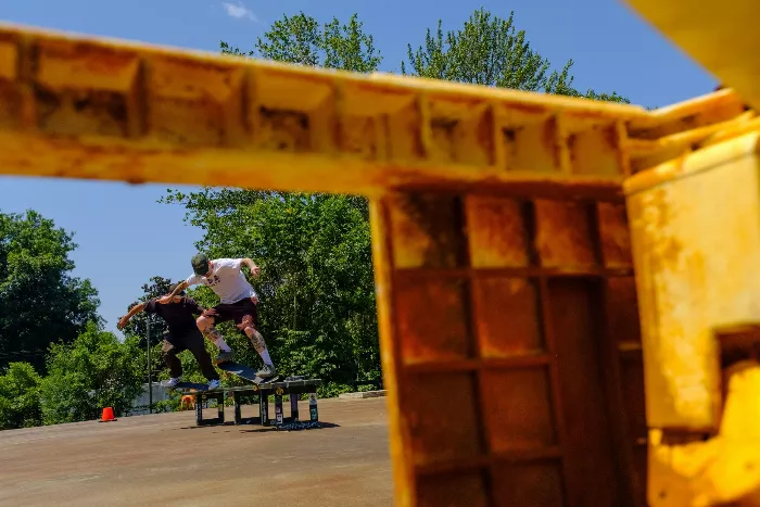 Professional skater Ty Ly with his Scumco board