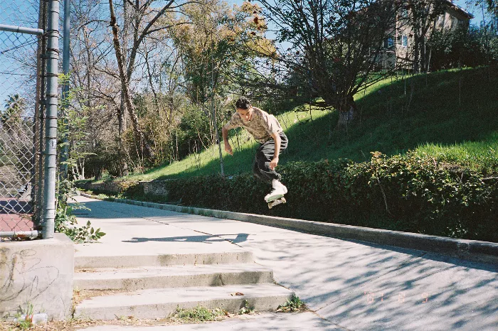 Remy Tav ollies in an alley in LA