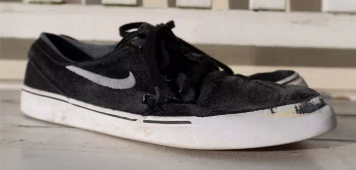 ripped nike skate shoe