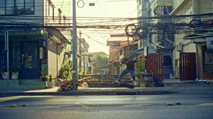 Ronnie Kessner performing a trick on a ledge in Bangkok