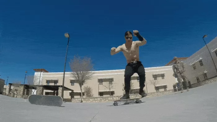 Saul Ojeda performing a kickflip with a nail-studded skateboard