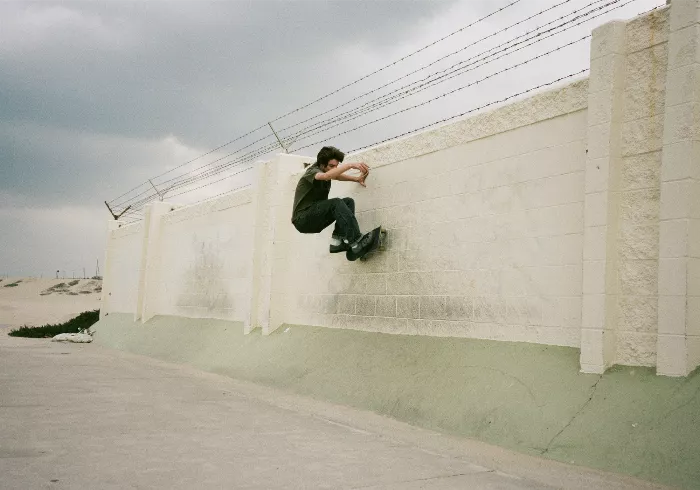 Shane Farber skating a mini ramp at his Bar Mitzvah