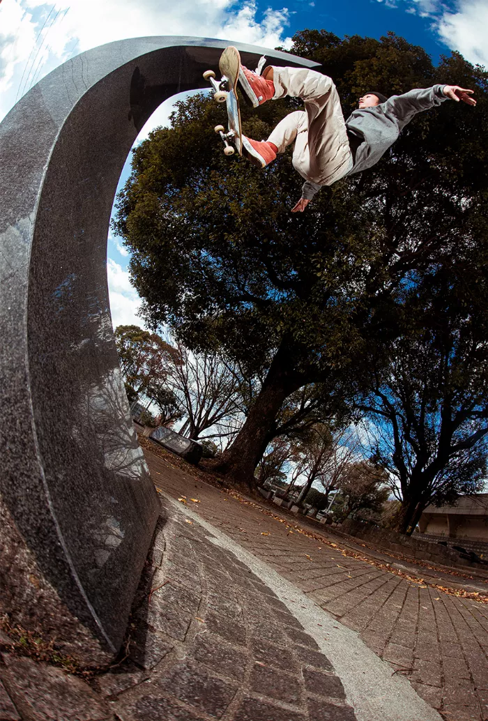 Shogo Zama skateboarding in the city