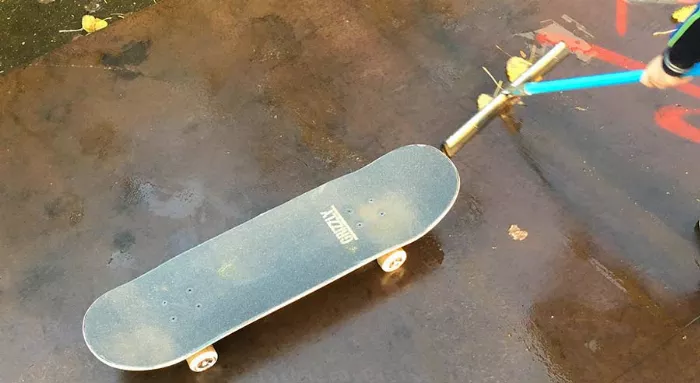 skateboard deck on a wet miniramp