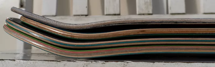 Skateboard decks with different concave shapes