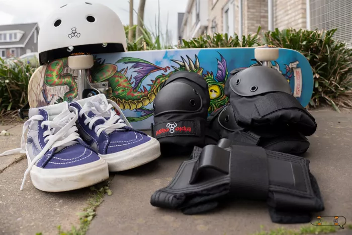 skateboard helmet, shoes, and protective gear