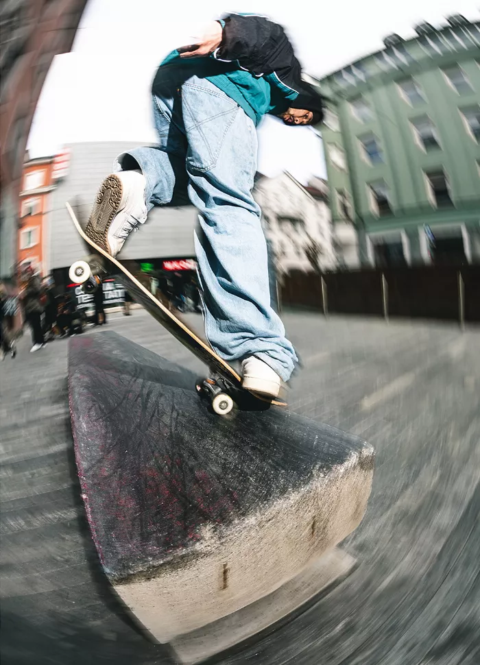 Skateboarder in Homeboy gear