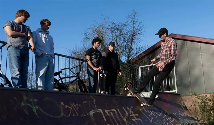 Skaters enjoying themselves at a skatepark