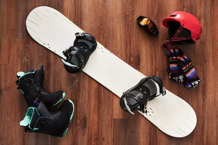 snowboard and boots on snow