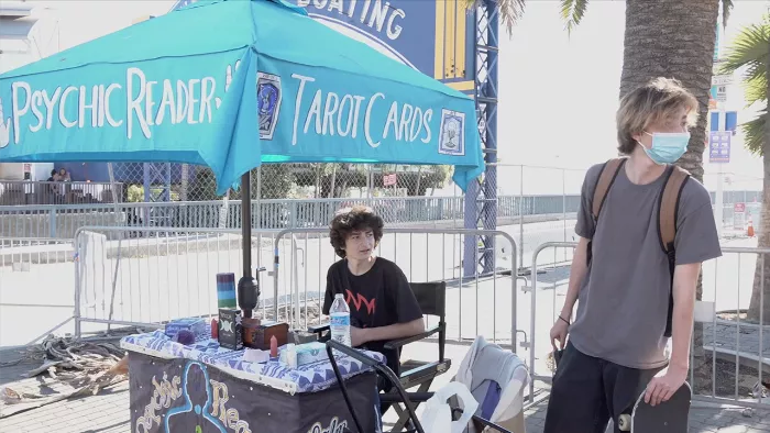 Sunny Suljic skateboarding, performing a trick on a street