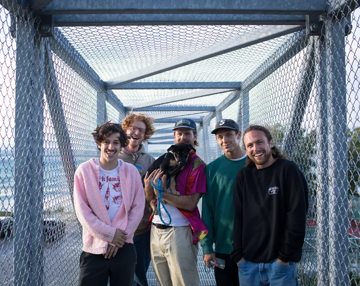 The Earthers crew poses for a group shot in Michigan, showcasing the team's camaraderie and shared passion for finding unique skate spots.