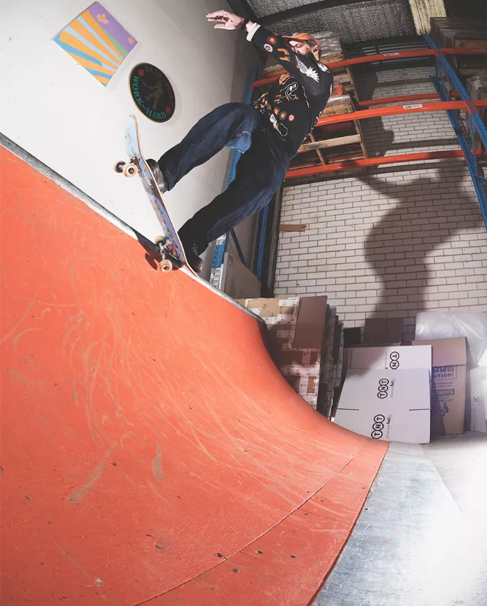 Trent Evans performing a pivot fakie