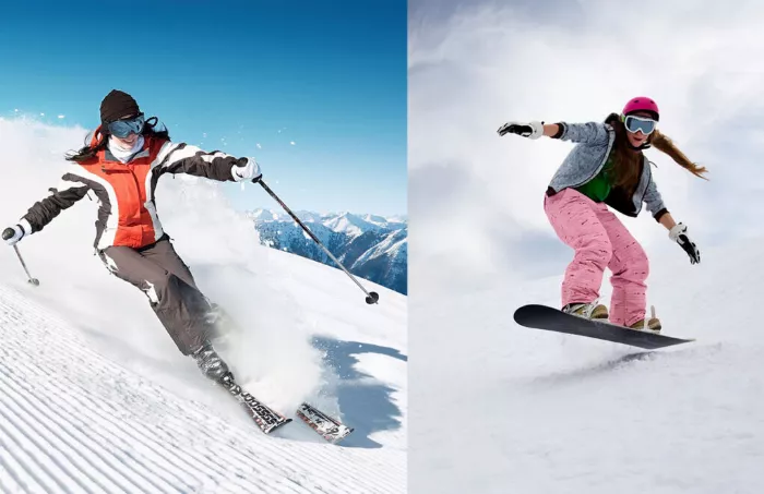 Two people, one snowboarding and one skiing down a snowy mountain