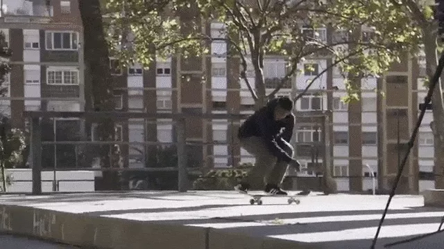 Tyshawn performs a half cab flip