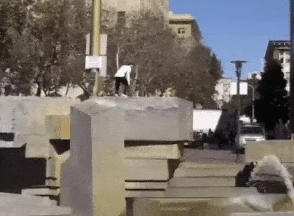 Walker Ryan performs a skateboard trick, demonstrating balance.