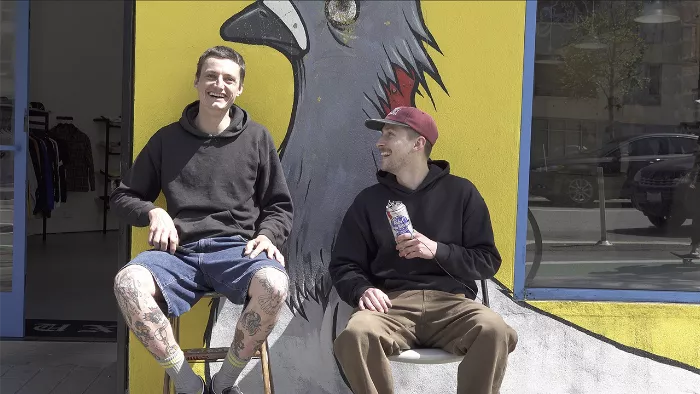 Zach &quot;Ducky&quot; Kovacs hosting Shop Talk at DLX Skate Shop, talking with a skateboarder